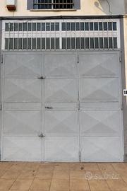 Porta garage a tre ante