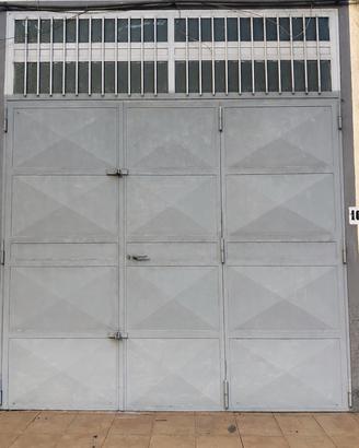 Porta garage a tre ante