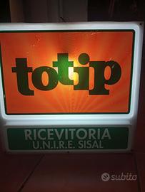 Insegna luminosa Totip