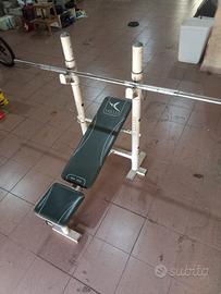 Panca, bilanciere, manubri e 86kg di dischi