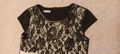 abito nero con corpetto  in pizzo