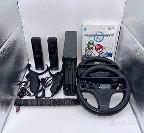 Nintendo Wii + wiimote + nunchuck + volanti+ gioco