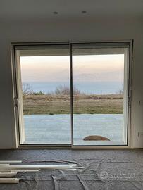 Serramento scorrevole doppia anta