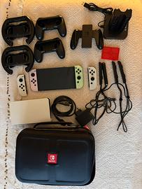 nintendo switch oled + giochi + accessori