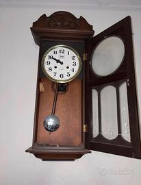 Orologio da parete vintage a pendolo