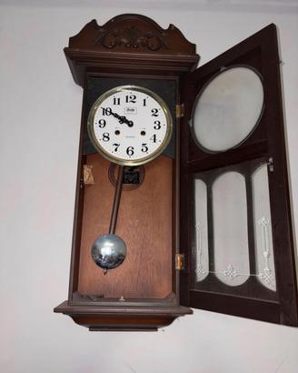 Orologio da parete vintage a pendolo