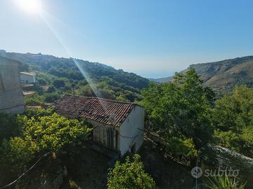 Casa e terreno