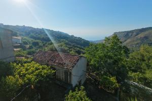 Casa e terreno