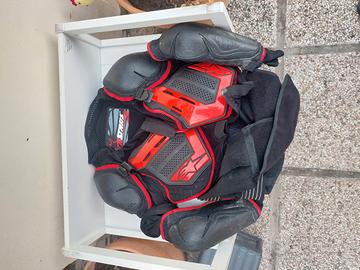 Pettorina racing Alpinestars nero/rosso