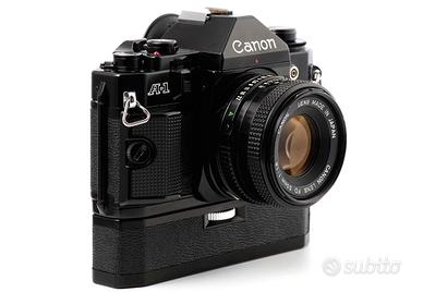 Canon A1  completa di trascinatore e obiettivo