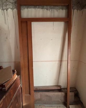 Cornice porta in rovere e vetro