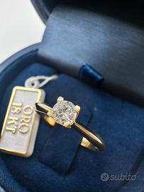 Anello in oto giallo e diamante naturale