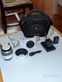 Nikon 1 J1 + obiettivi + batterie + sacca