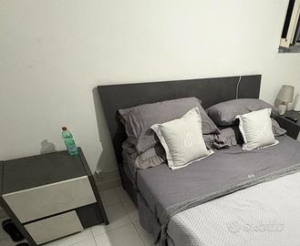 Letto con comodini