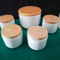 CERAMICA BIANCA: 1 BISCOTTIERA e 4 VASI