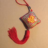 Decorazione tessile da appendere