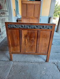 Letto antico in legno massello con intaglio