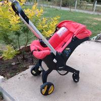 Seggiolino auto/passeggino DOONA colore salmone