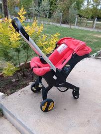 Seggiolino auto/passeggino DOONA colore salmone