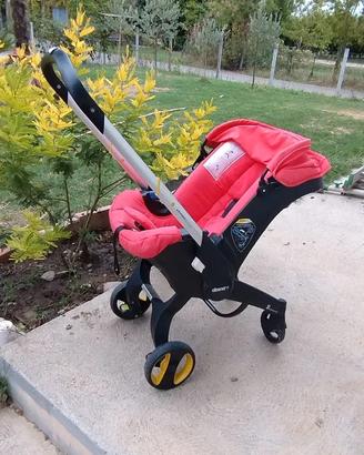 Seggiolino auto/passeggino DOONA colore salmone