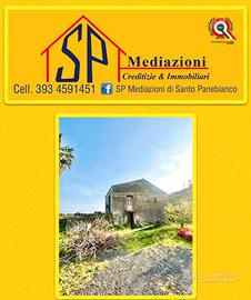 Ampio Terreno con Fabbricato