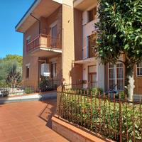 Appartamento con giardino e taverna