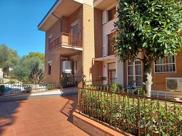 Appartamento con giardino e taverna