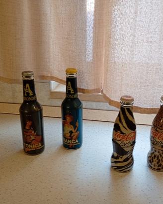 bottiglie coca /Abbondanza 