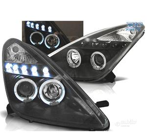 FARI TOYOTA CELICA T23 99-05 LED OCCHI ANGELI NERI