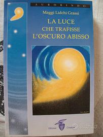 LA LUCE CHE TRAFISSE L'OSCURO ABISSO