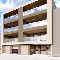 Trivani in costruzione con posto auto