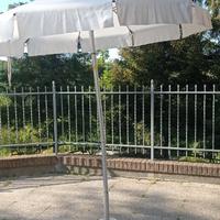 Ombrellone in tela color panna