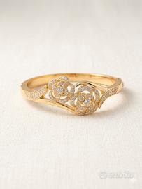Bracciale rigido dorato con rose e brillantini