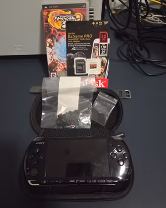 psp 3004+micro sd nuova sigillata+naruto+custodia