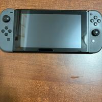 Nintendo Switch nera + Pokemon Perla Lucente