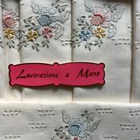 Lenzuoli lavorazione a mano