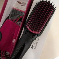 Spazzola scaldata lisciante 