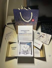 omega swatch mission to earthphase mooshine gold