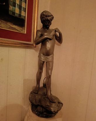statua 