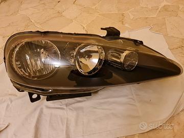 Faro destro e sinistro Originale Alfa Romeo 147