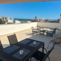 Attico centrale, terrazza panoramica e posto auto