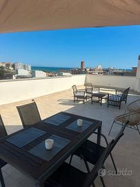 Attico centrale, terrazza panoramica e posto auto