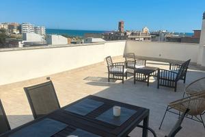 Attico centrale, terrazza panoramica e posto auto