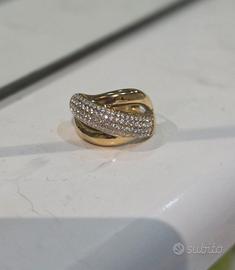 ANELLO A FASCIA INCROCIATA IN ACCIAO INOSSIDABILE