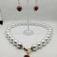 parure collana e orecchini 