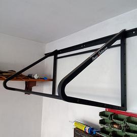 porta gomme da parete regolabile