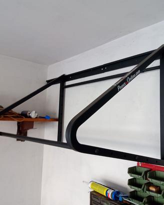 porta gomme da parete regolabile