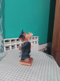 Statuina "Il dentista"