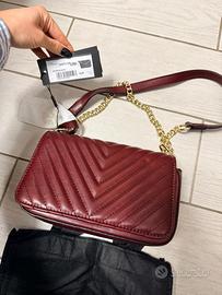 Primadonna bordeaux elegante con dust bag nuova