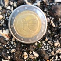 Moneta con Persona a strisce